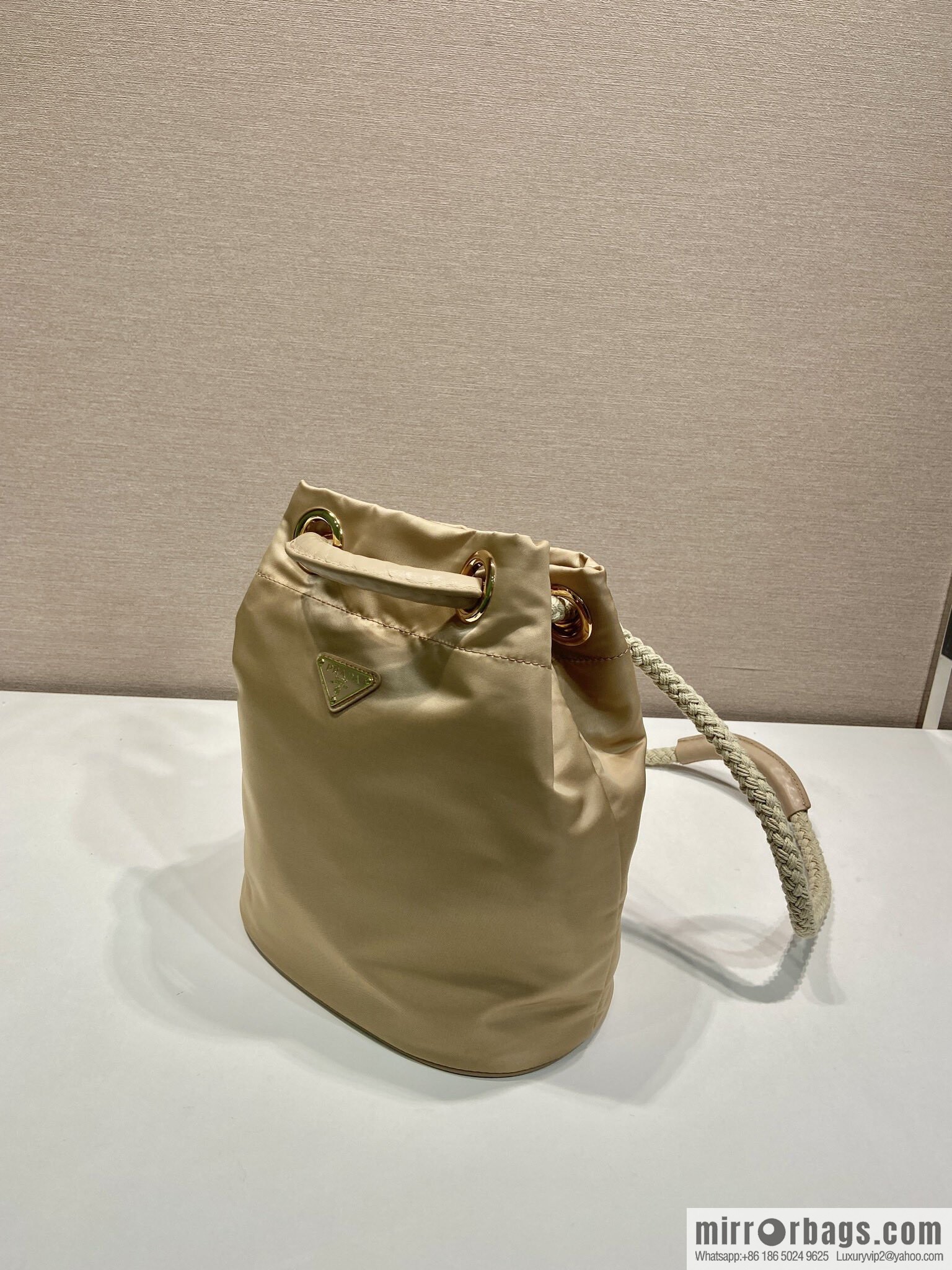Prada's new bucket bag 1BE082 catwalk model, apricot.