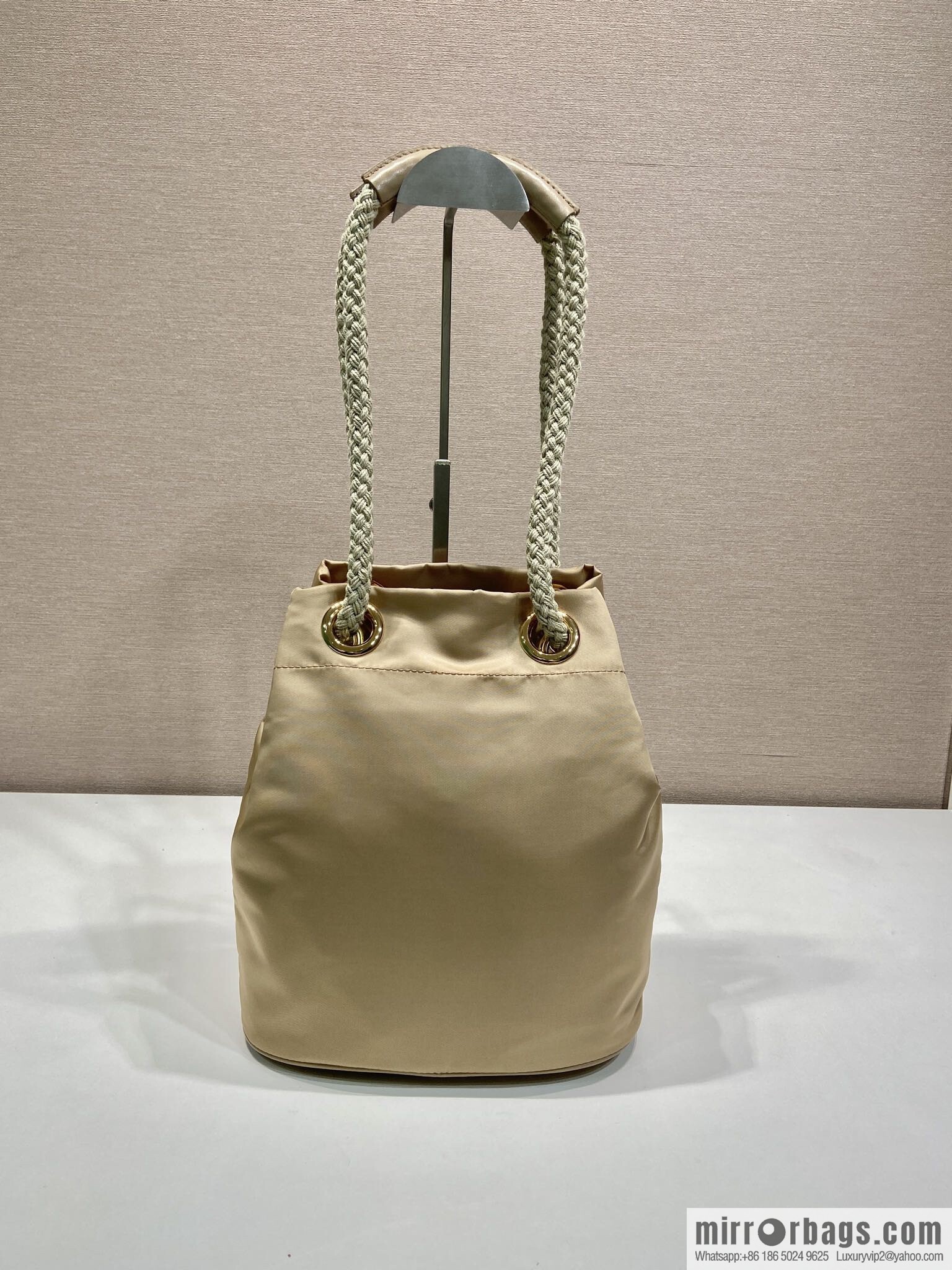 Prada's new bucket bag 1BE082 catwalk model, apricot.