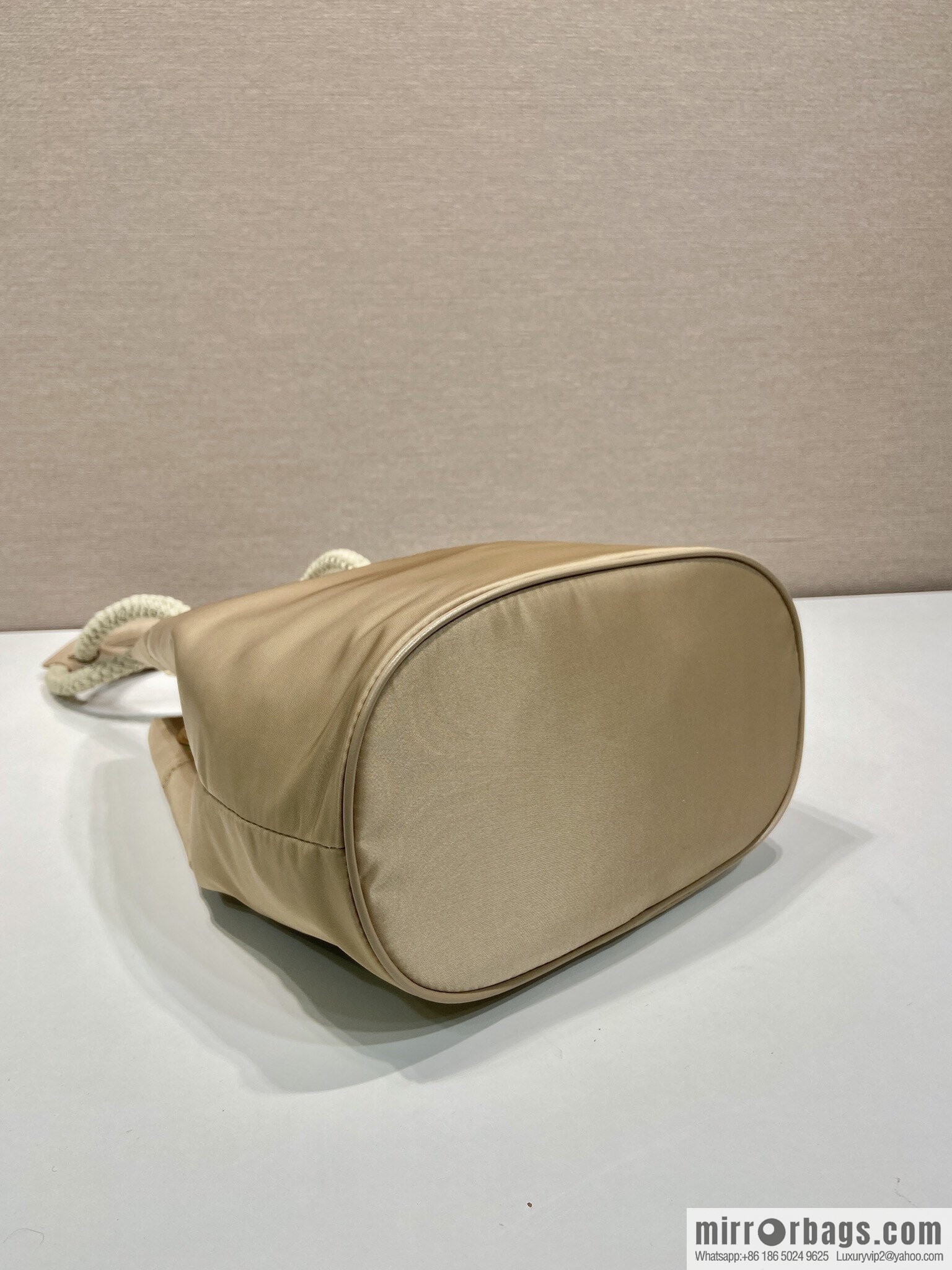 Prada's new bucket bag 1BE082 catwalk model, apricot.