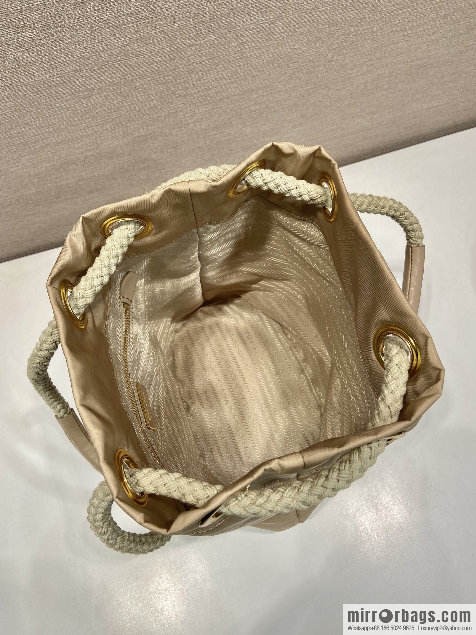 Prada's new bucket bag 1BE082 catwalk model, apricot.