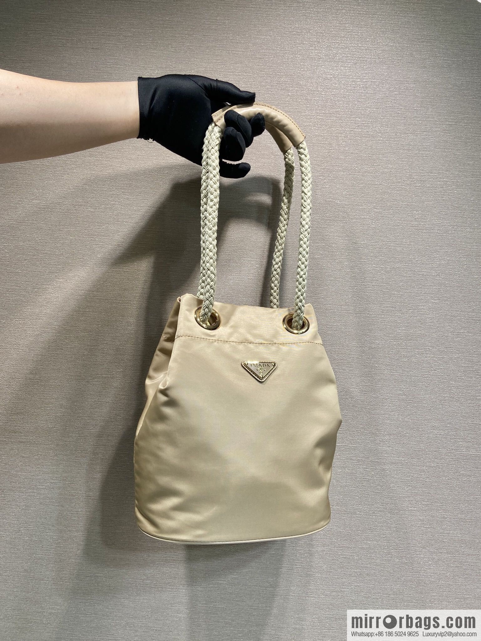 Prada's new bucket bag 1BE082 catwalk model, apricot.