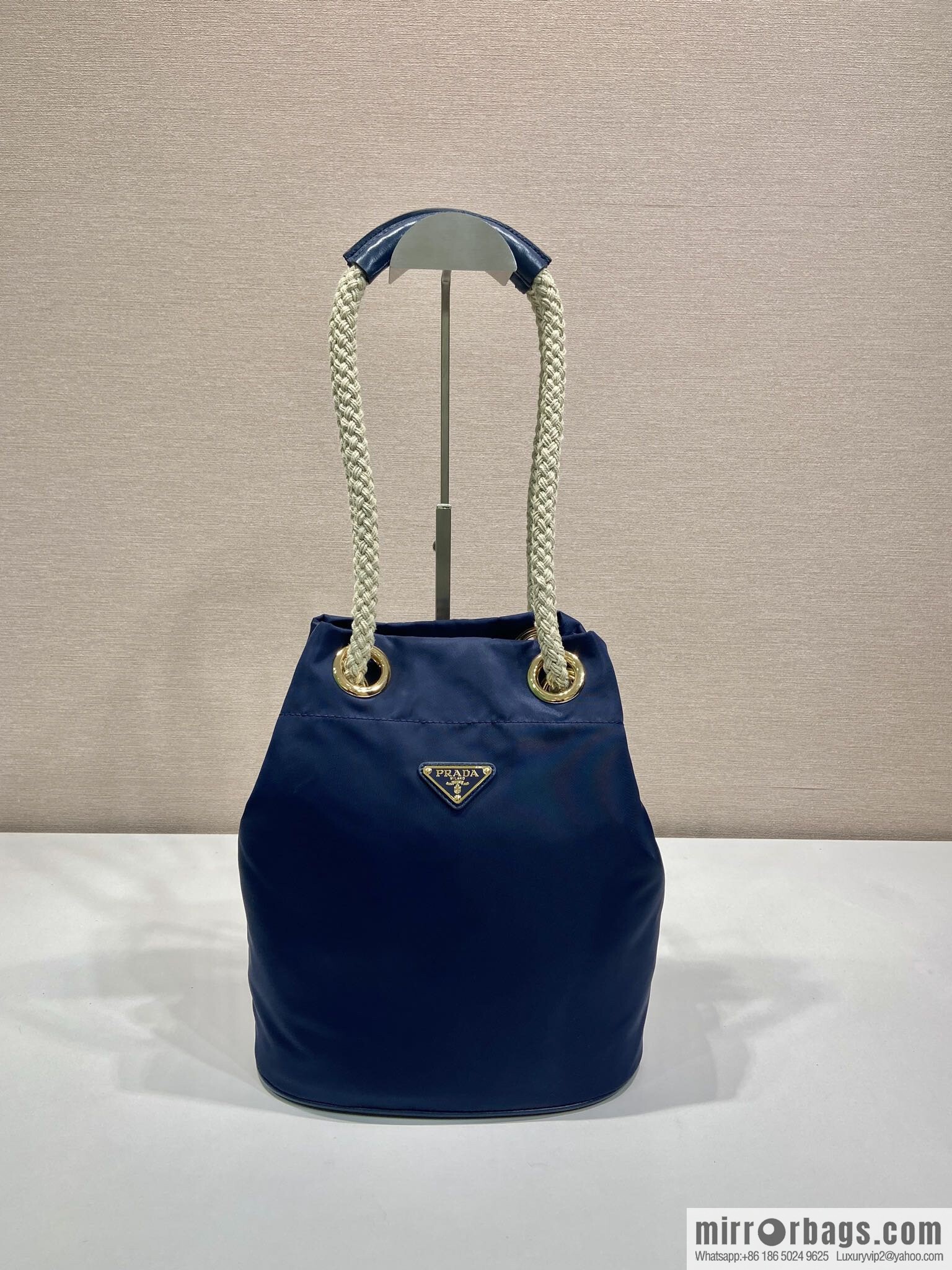 Prada's new bucket bag 1BE082 catwalk model, blue.