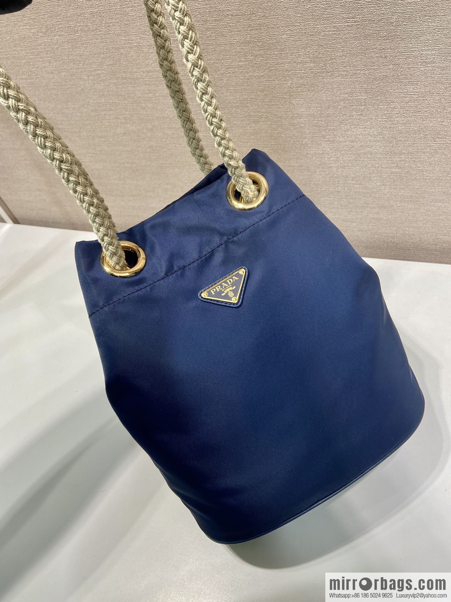 Prada's new bucket bag 1BE082 catwalk model, blue.