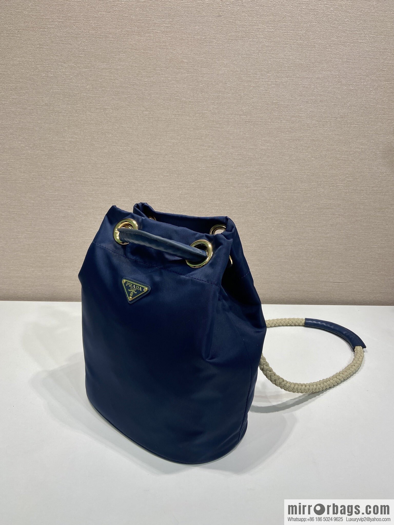 Prada's new bucket bag 1BE082 catwalk model, blue.