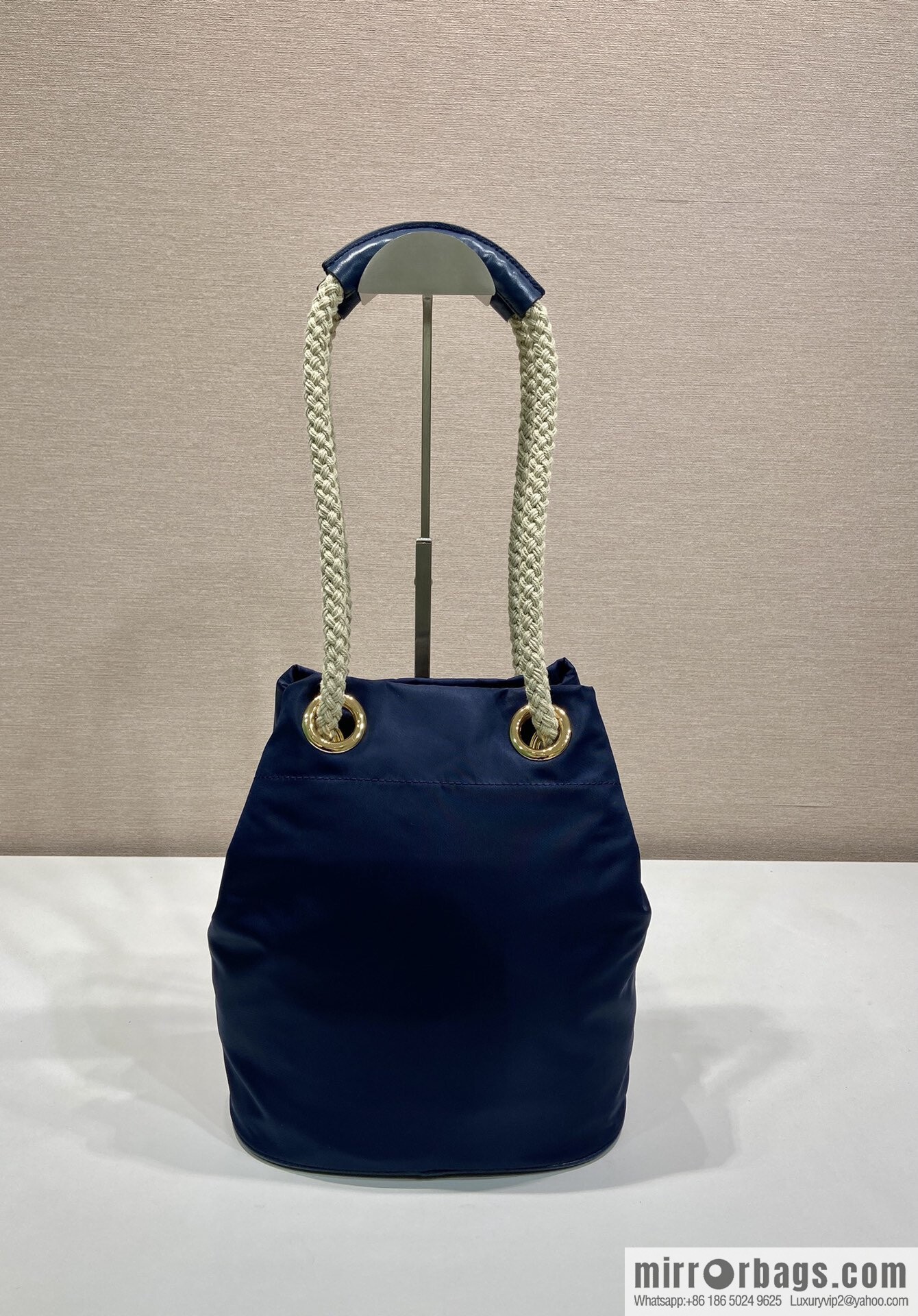 Prada's new bucket bag 1BE082 catwalk model, blue.