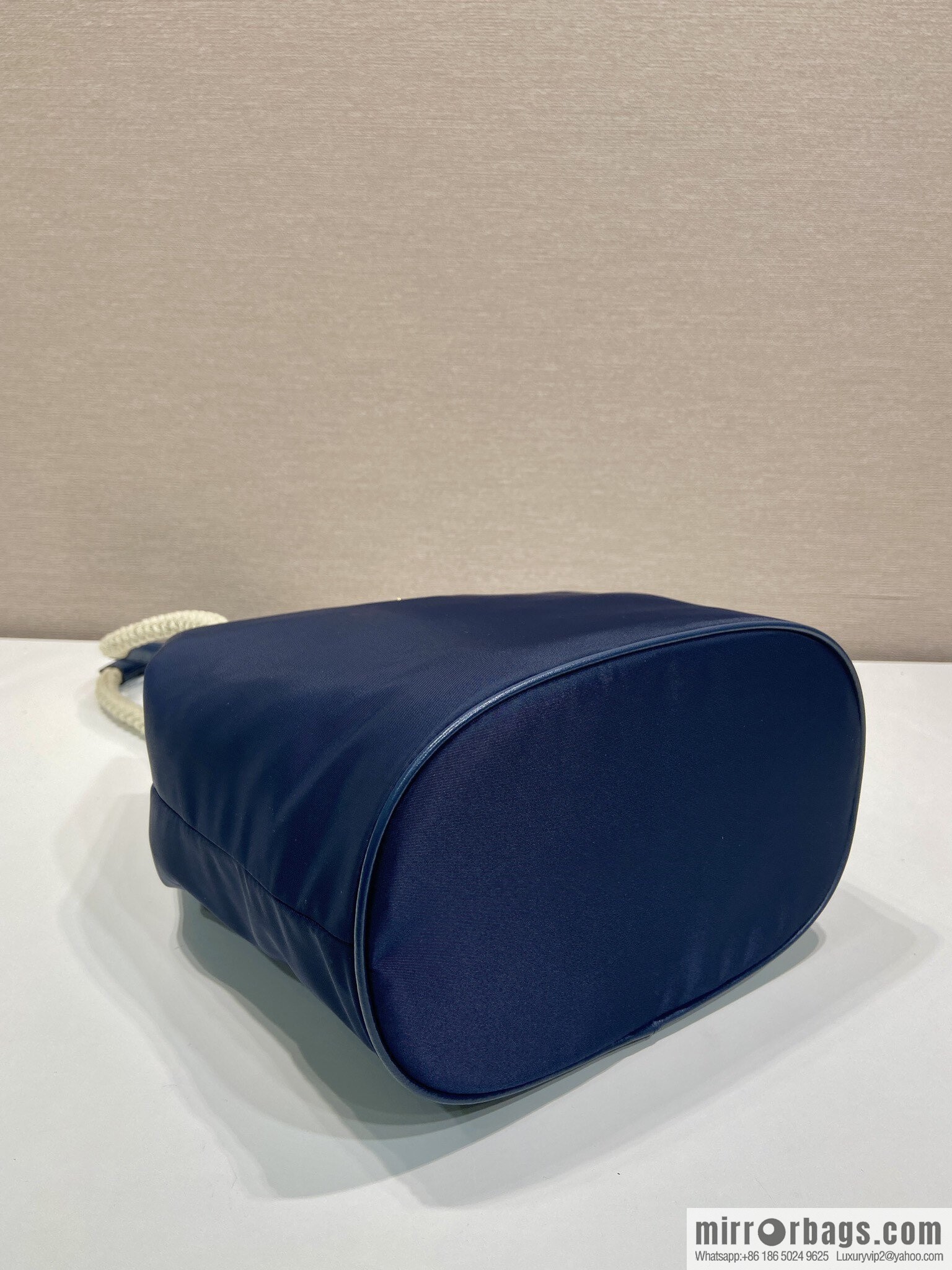 Prada's new bucket bag 1BE082 catwalk model, blue.