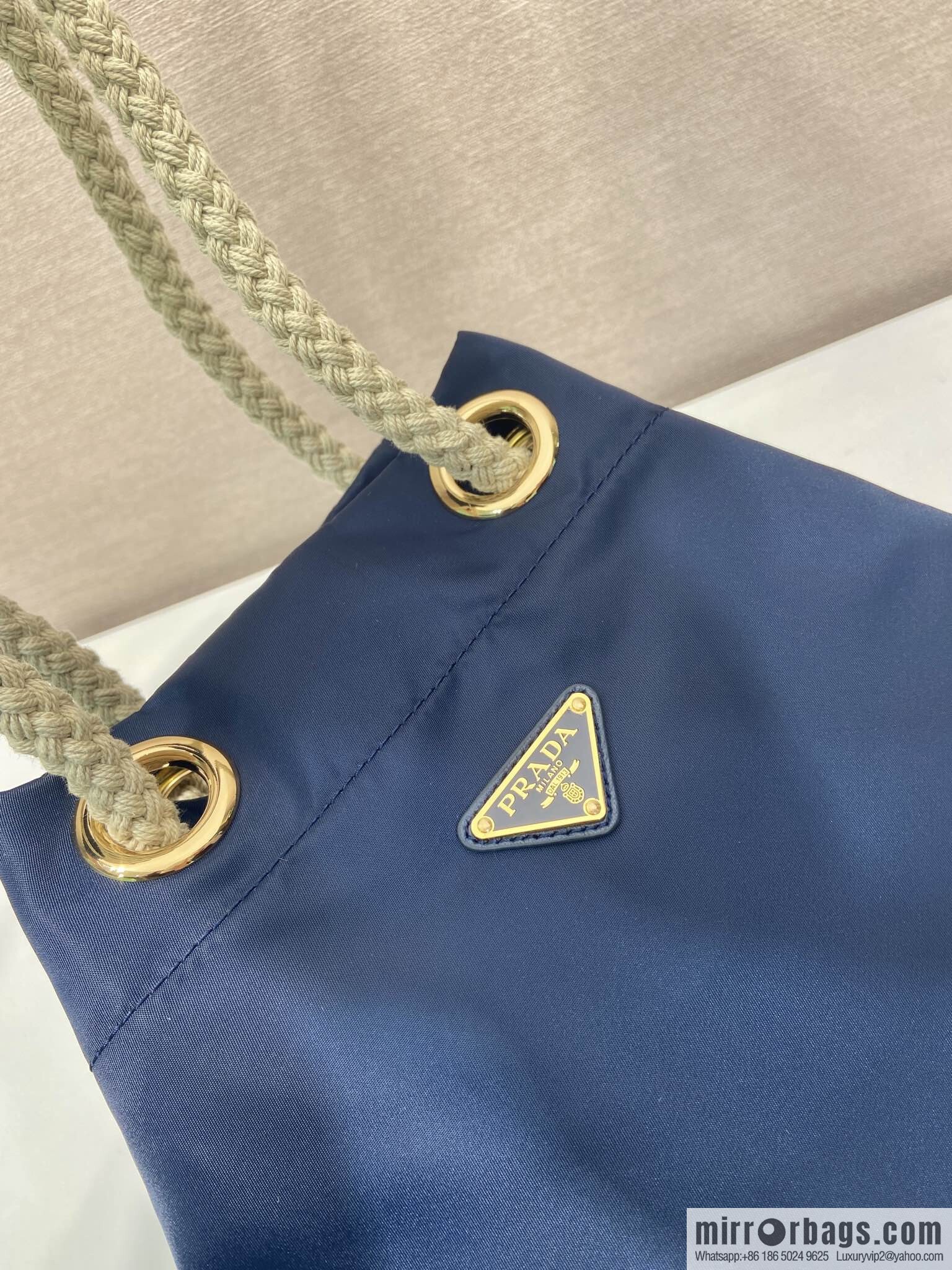 Prada's new bucket bag 1BE082 catwalk model, blue.