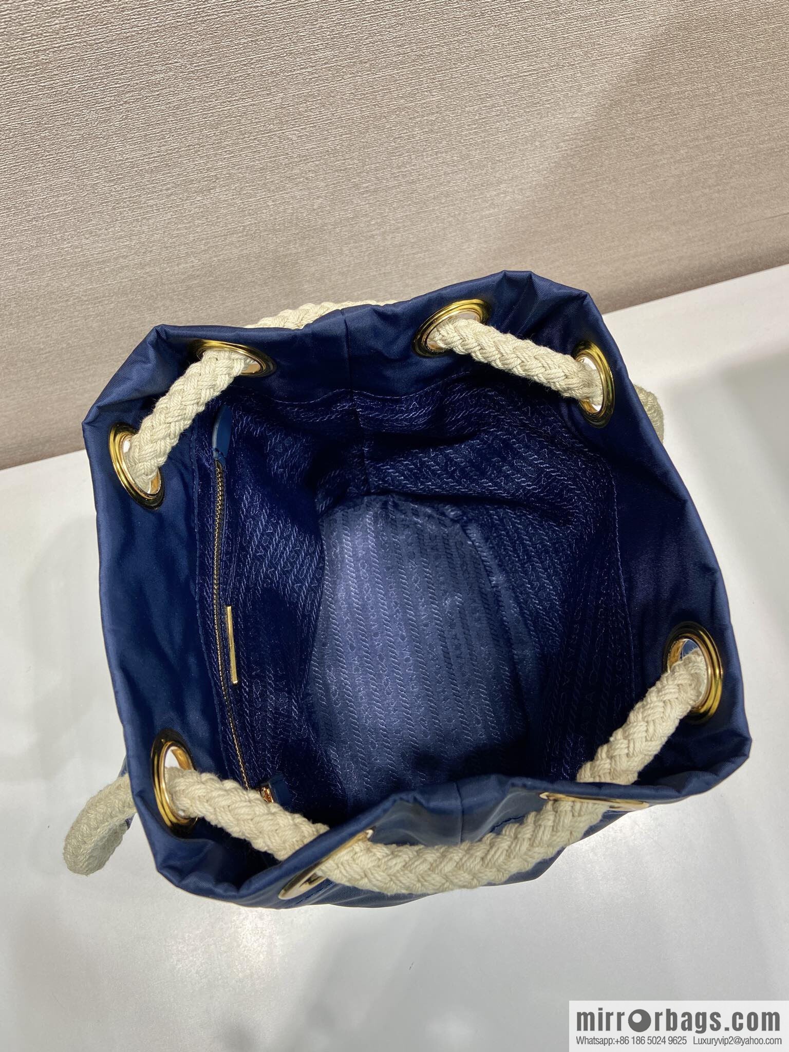 Prada's new bucket bag 1BE082 catwalk model, blue.