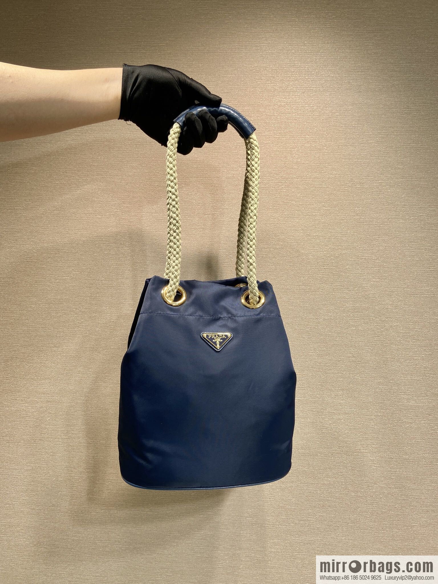 Prada's new bucket bag 1BE082 catwalk model, blue.