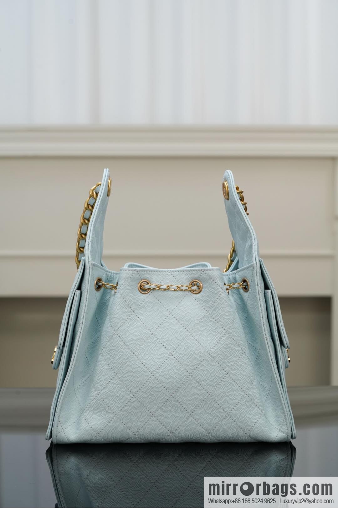 ππ‘ππ§ππ₯ πππ¬ π¬π¦ππ₯π₯ π‘π¨ππ¨ Drawstring Bucket Bag, Tiffany Blue π S AS5293