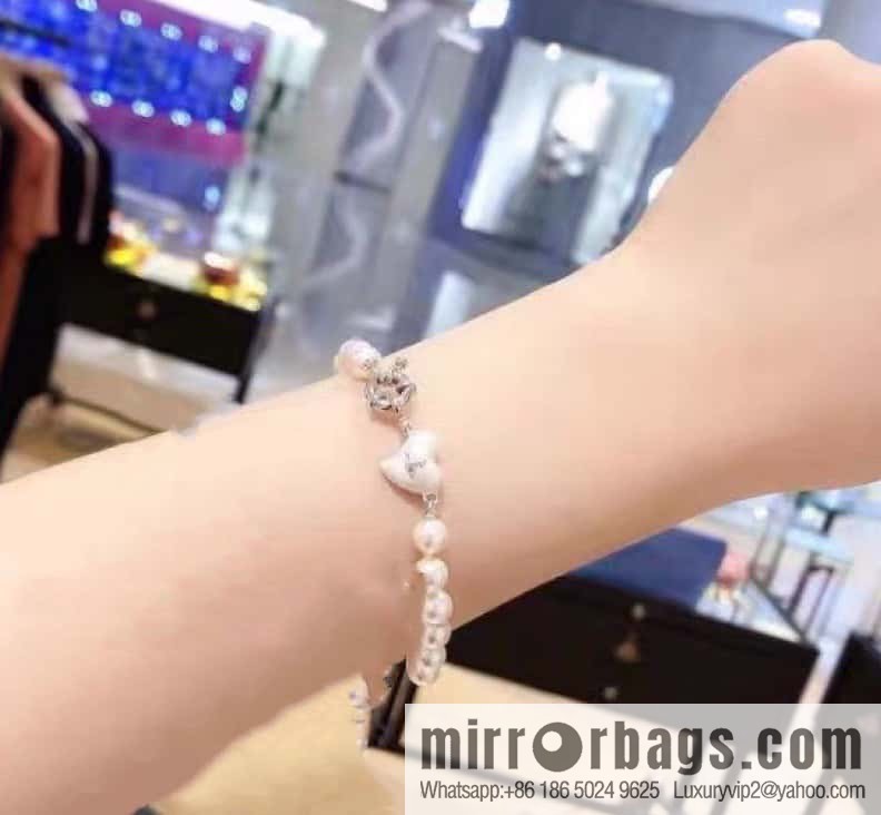New ☑️ Vivienne Westwood Queen Mother peach heart love Saturn pearl bracelet