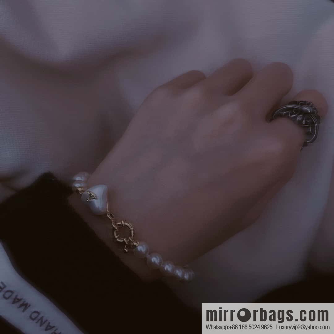 New ☑️ Vivienne Westwood Queen Mother peach heart love Saturn pearl bracelet