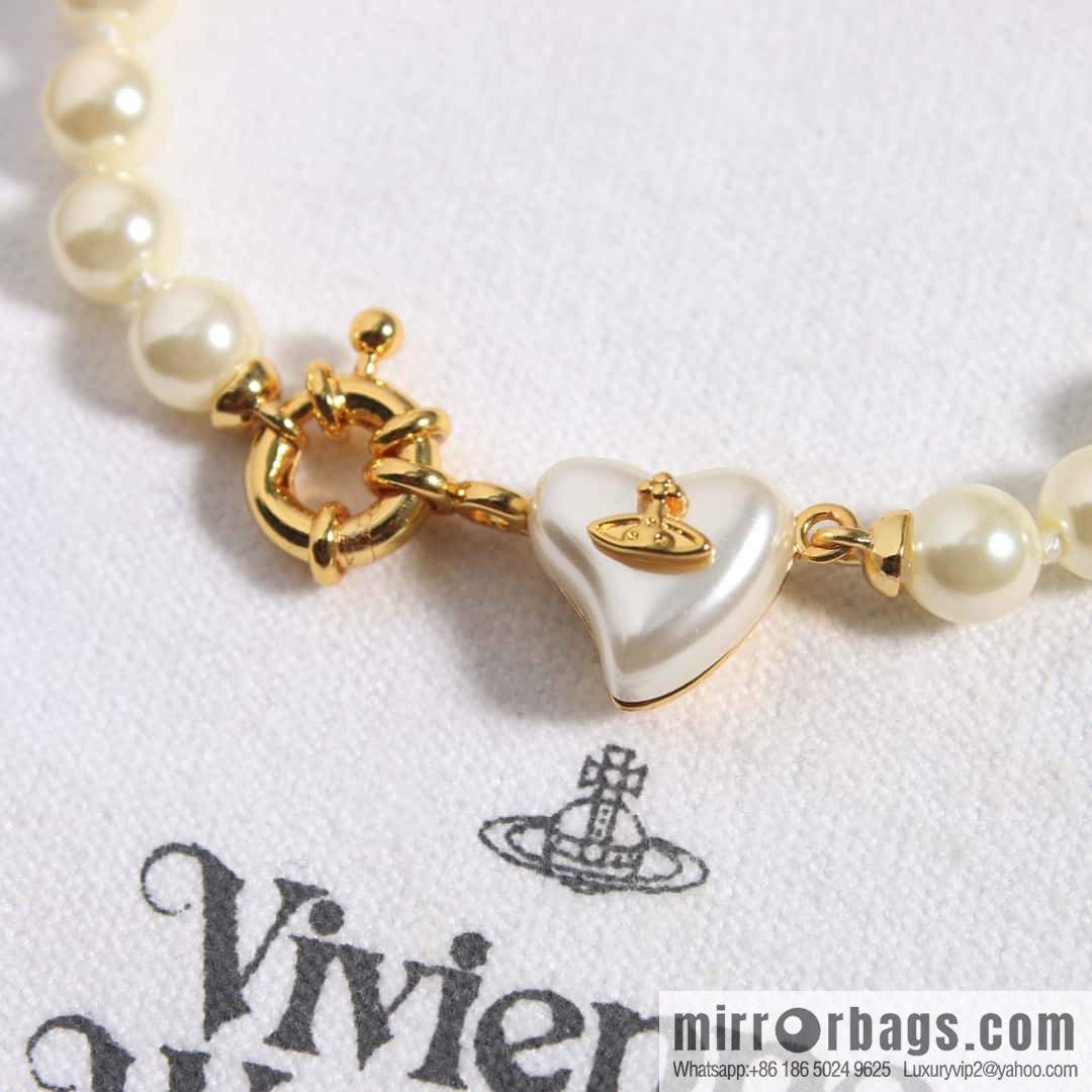 New ☑️ Vivienne Westwood Queen Mother peach heart love Saturn pearl bracelet