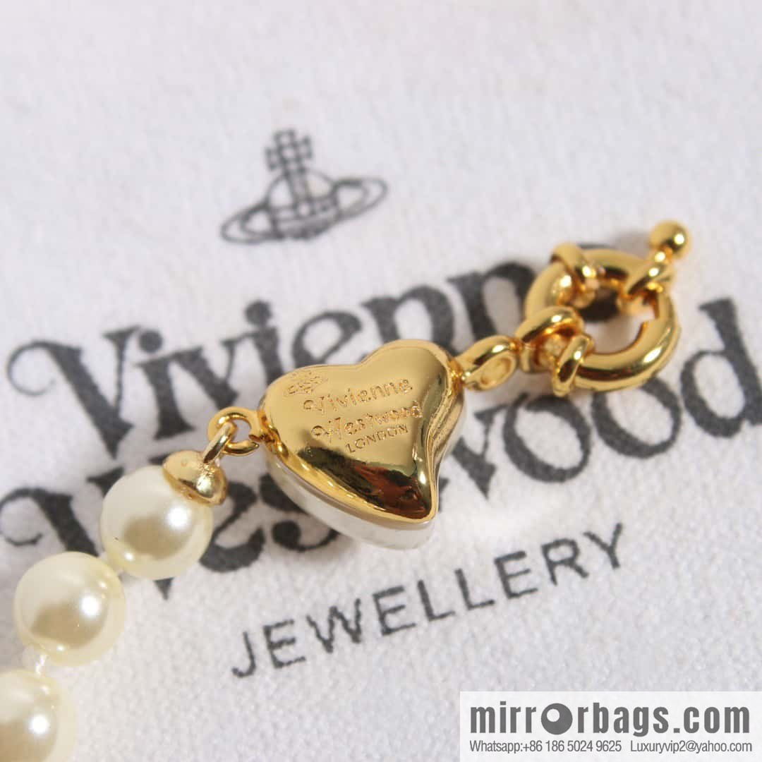 New ☑️ Vivienne Westwood Queen Mother peach heart love Saturn pearl bracelet