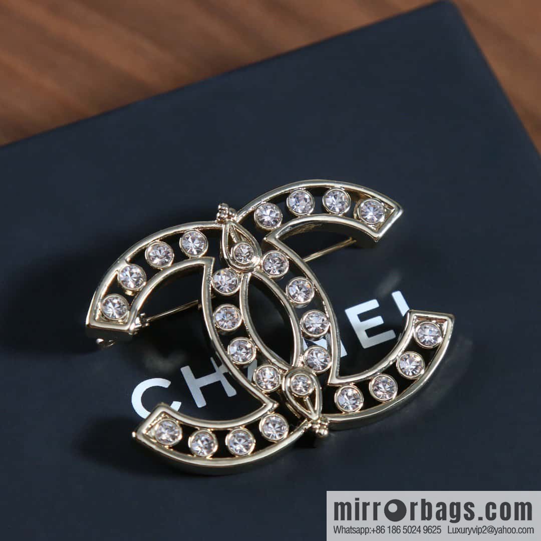 New, Chanel full diamond double c brooch.