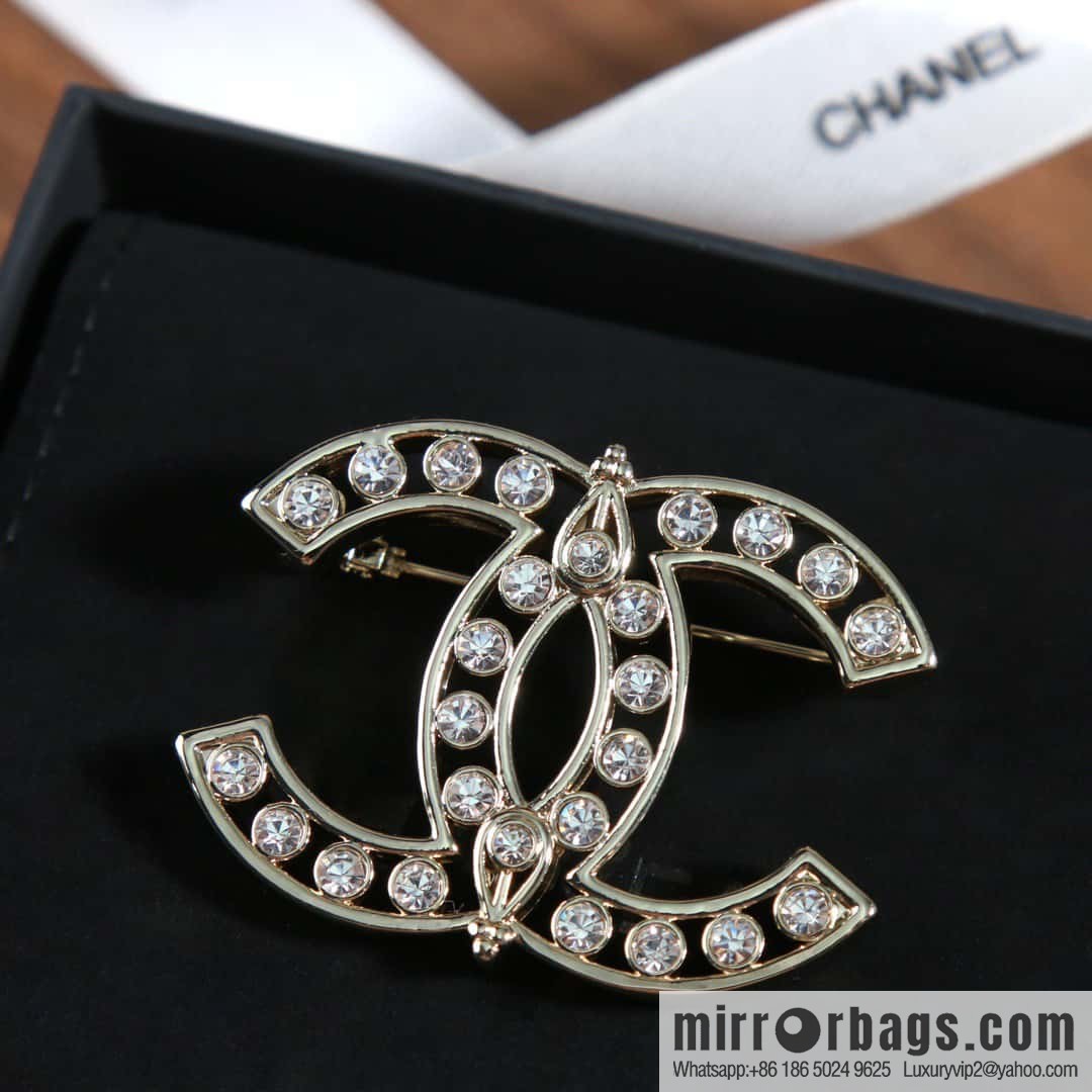 New, Chanel full diamond double c brooch.
