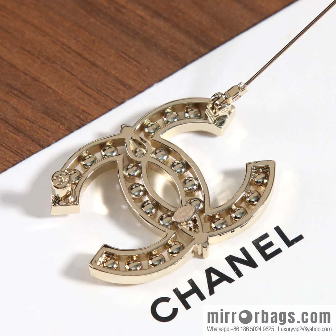 New, Chanel full diamond double c brooch.