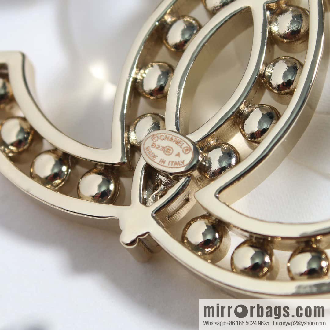 New, Chanel full diamond double c brooch.