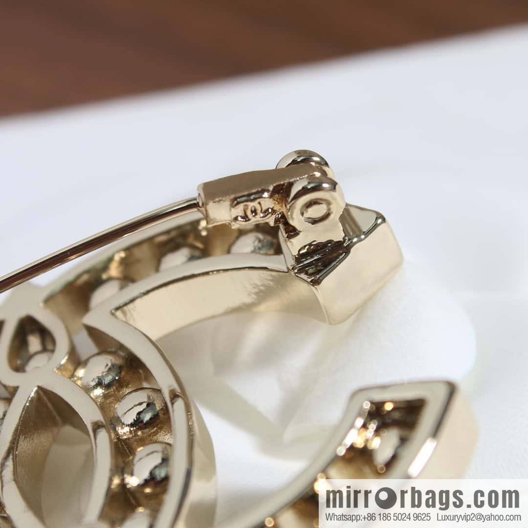 New, Chanel full diamond double c brooch.