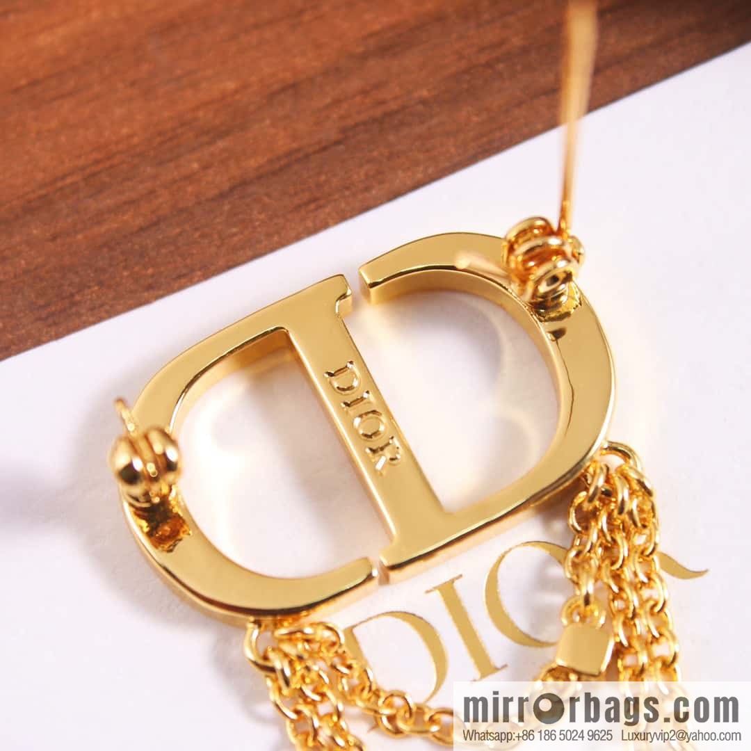 New ☑️ DIOR gold CD fringed brooch