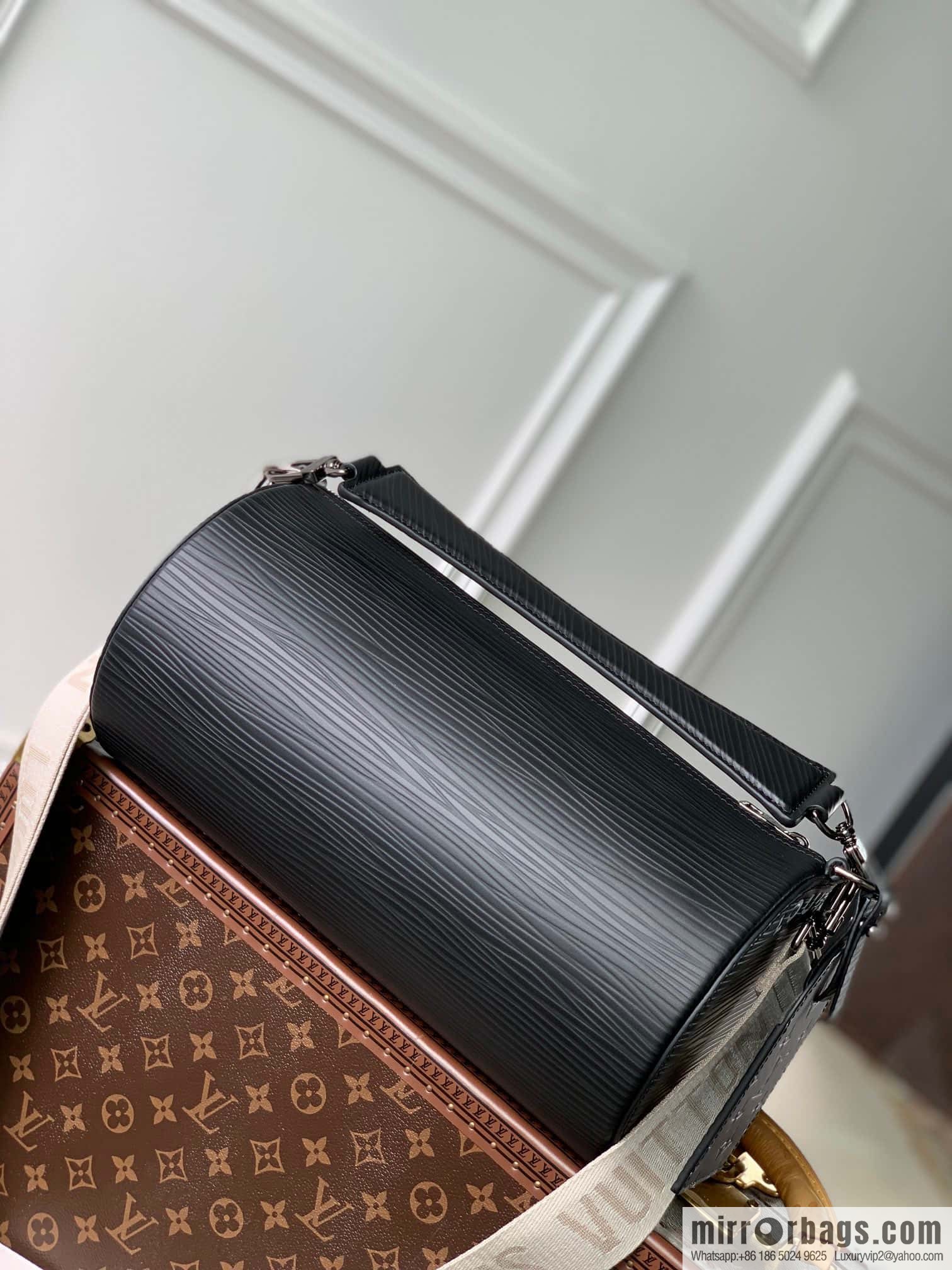M23092 black Soft Polochon handbag