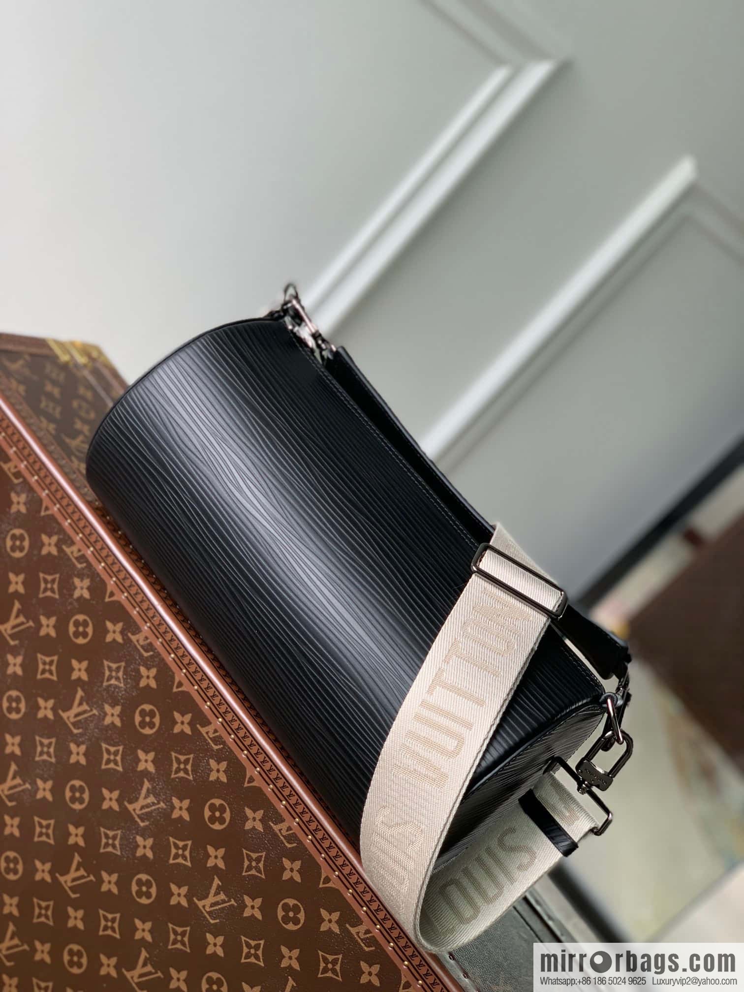 M23092 black Soft Polochon handbag
