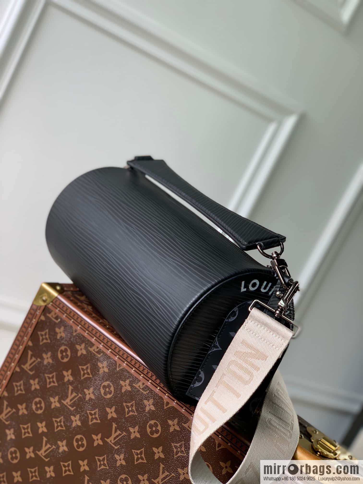 M23092 black Soft Polochon handbag
