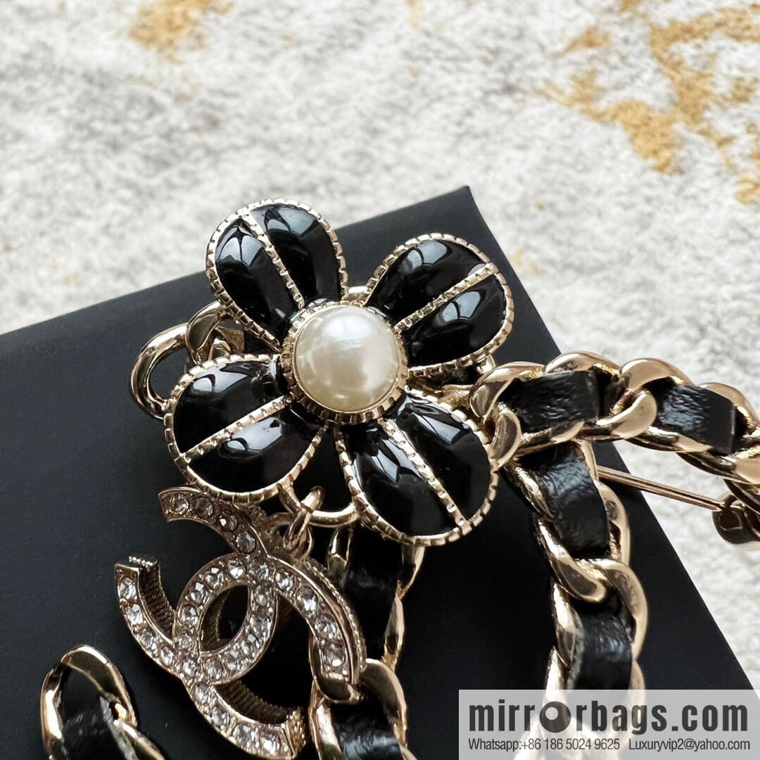 New Chanel double c camellia black leather rope brooch