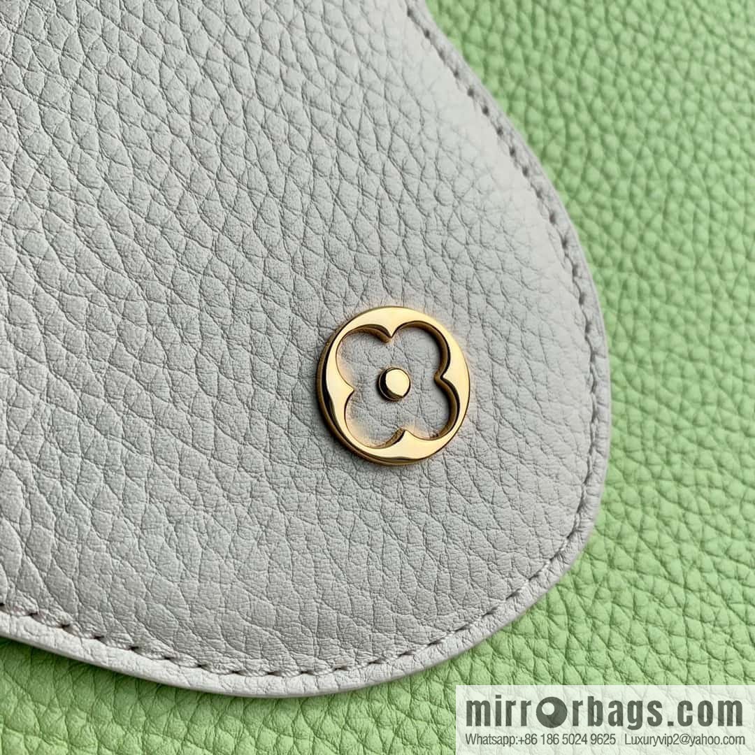 M21689 green with white M22055 CAPUCINES medium handbag