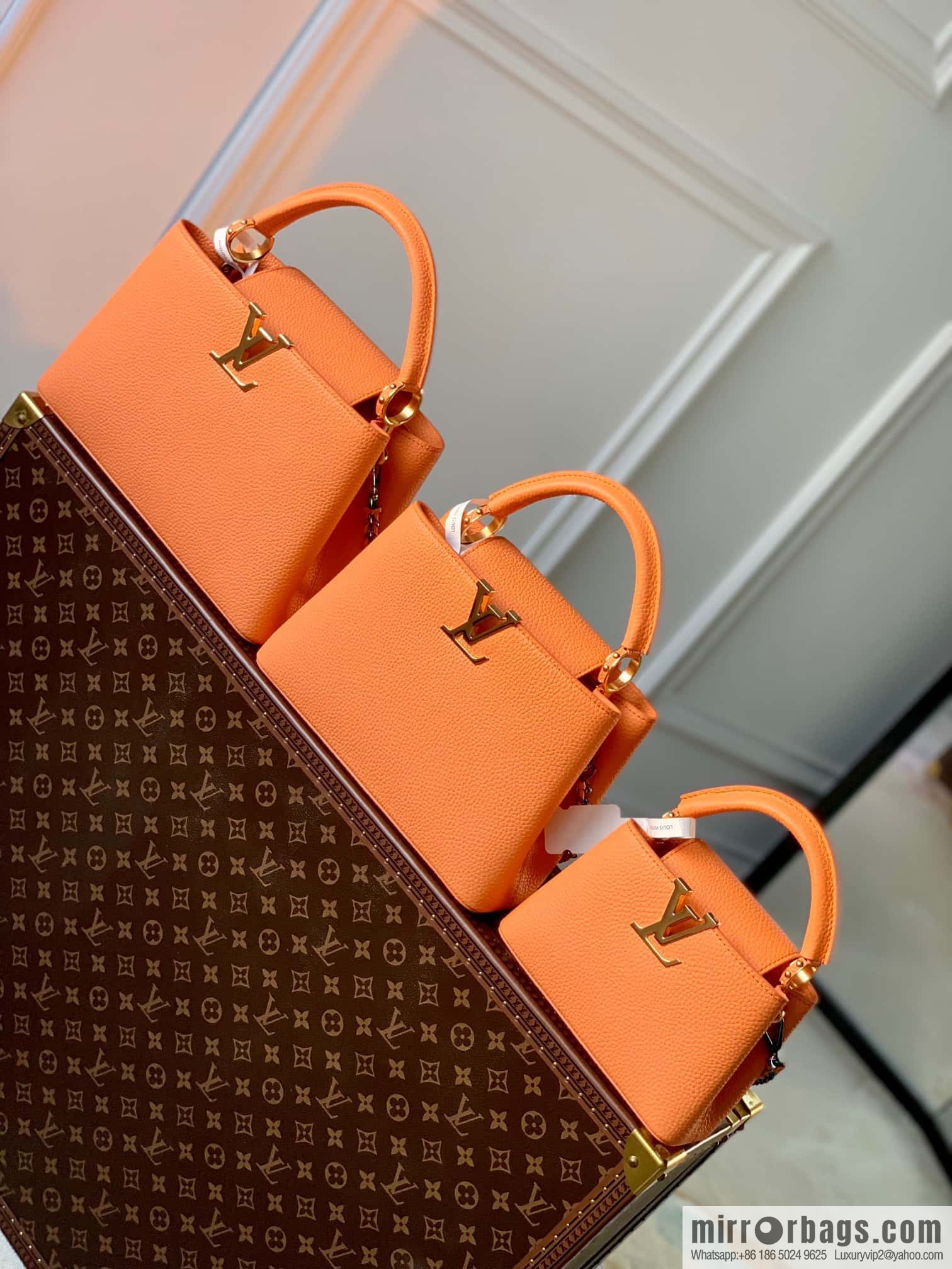 M22055 Coral orange mini Capucines Mini handbag