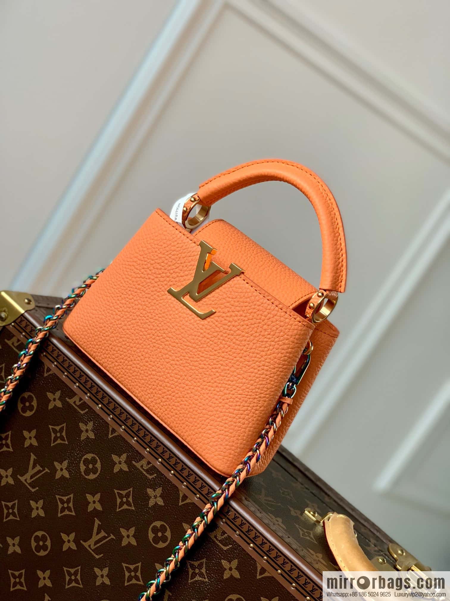 M22055 Coral orange mini Capucines Mini handbag