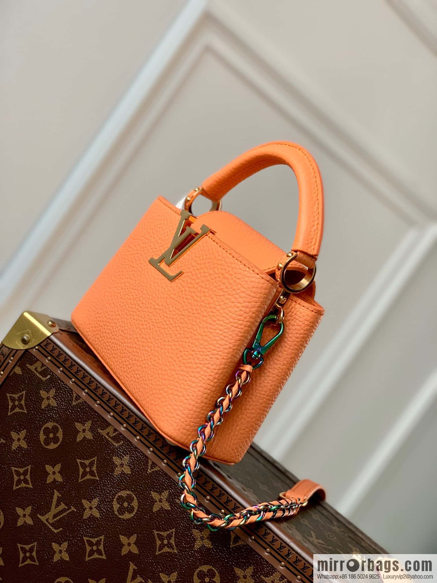 M22055 Coral orange mini Capucines Mini handbag
