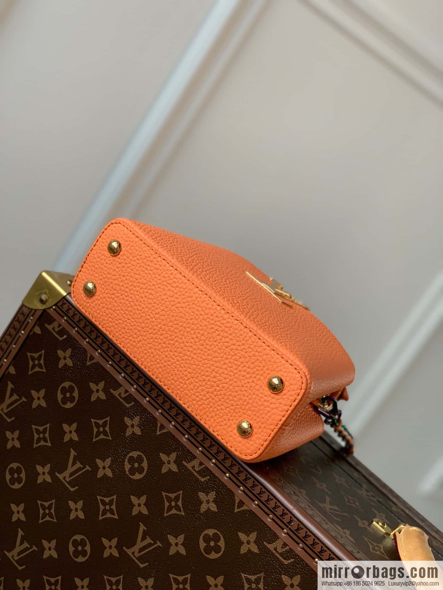 M22055 Coral orange mini Capucines Mini handbag