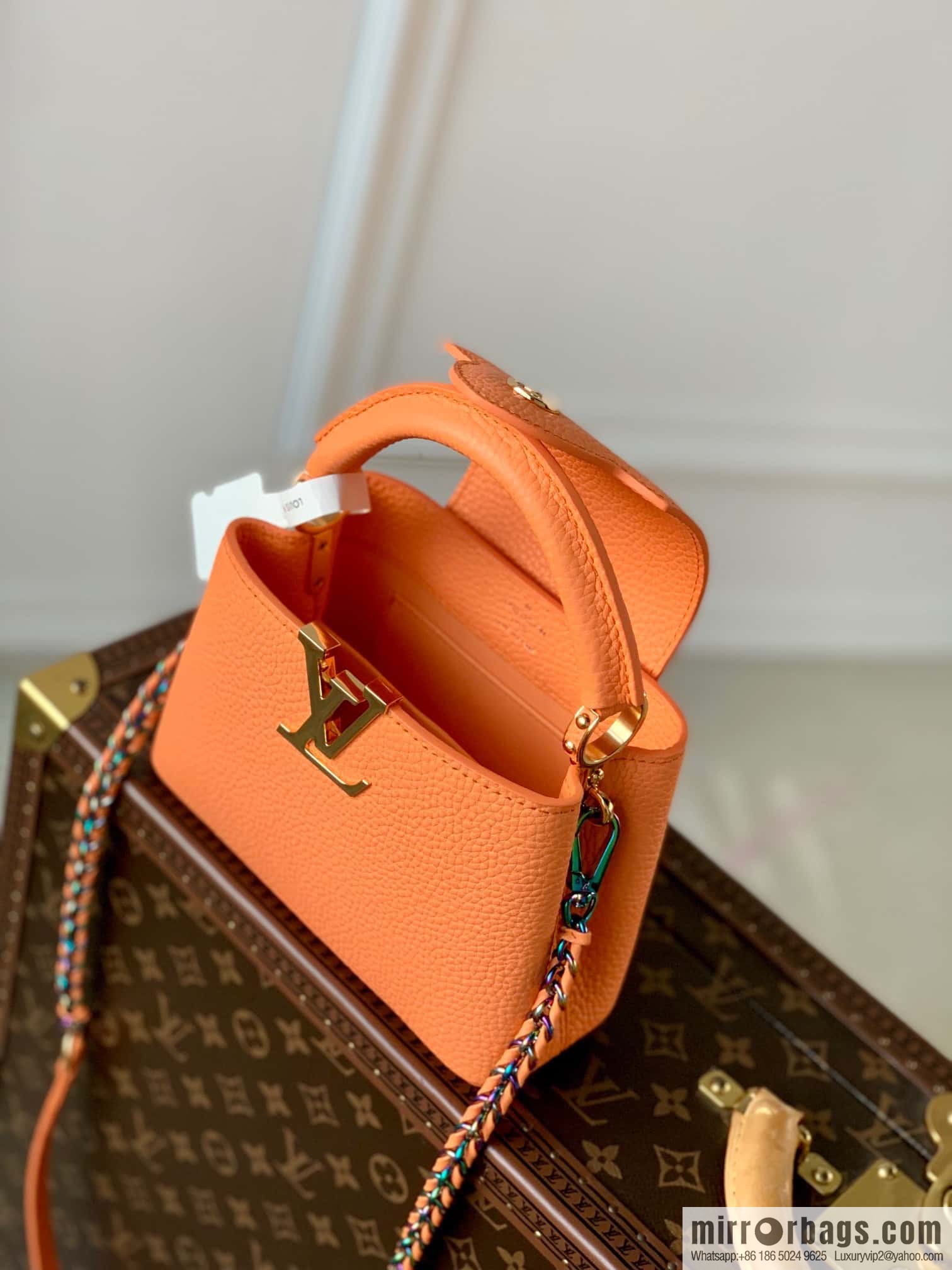 M22055 Coral orange mini Capucines Mini handbag