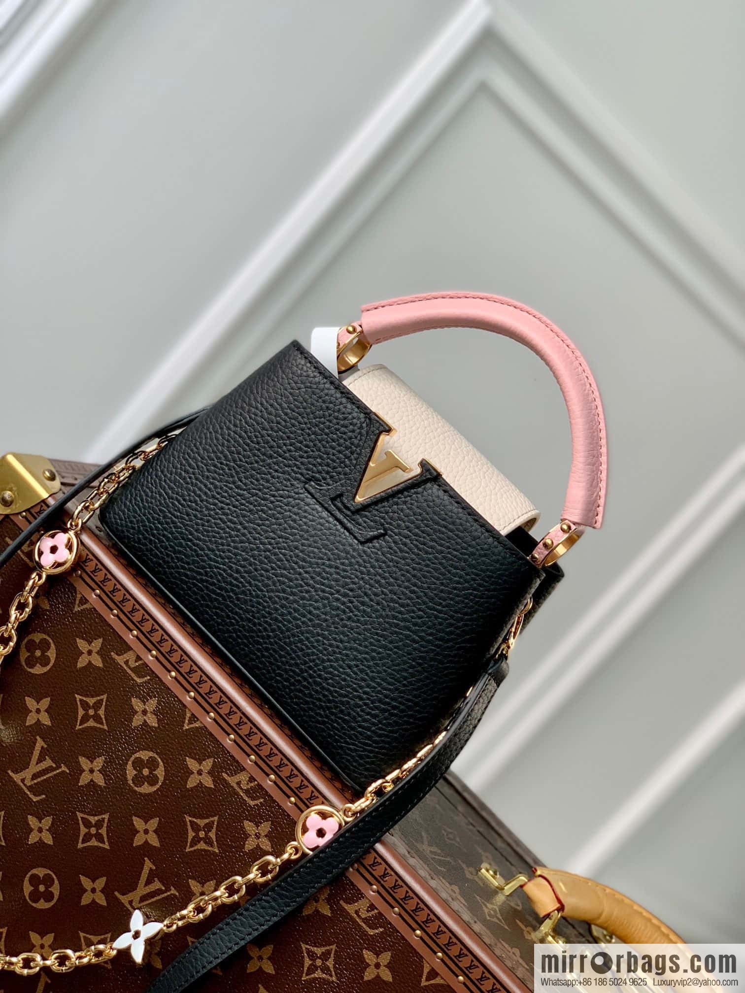 M22375 black mini Capucines mini handbag