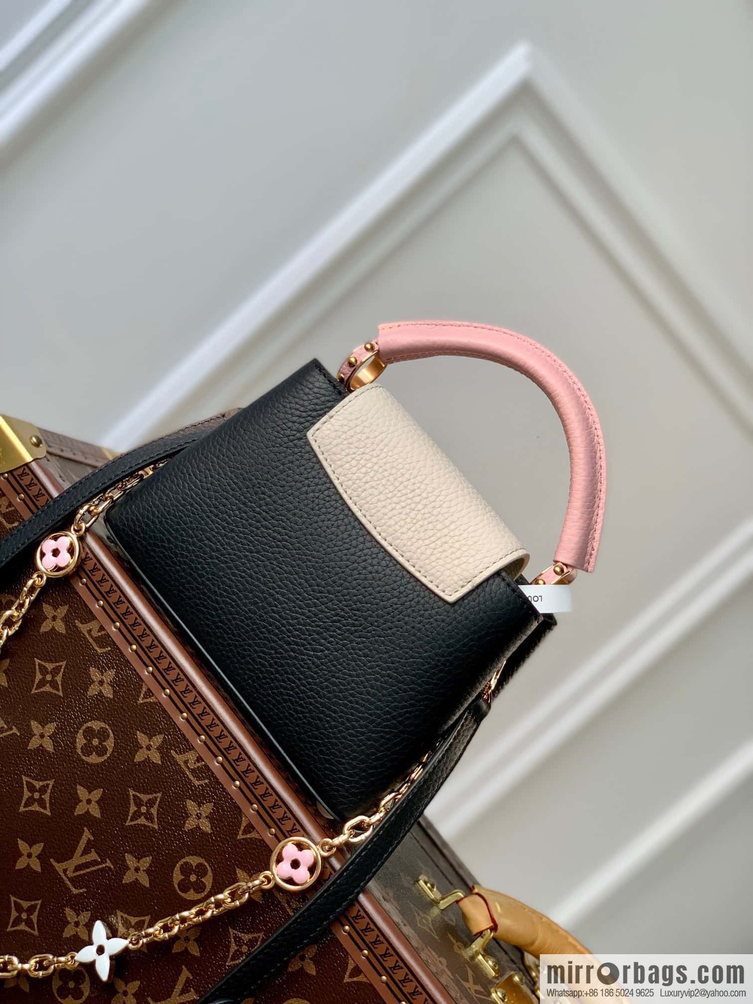 M22375 black mini Capucines mini handbag