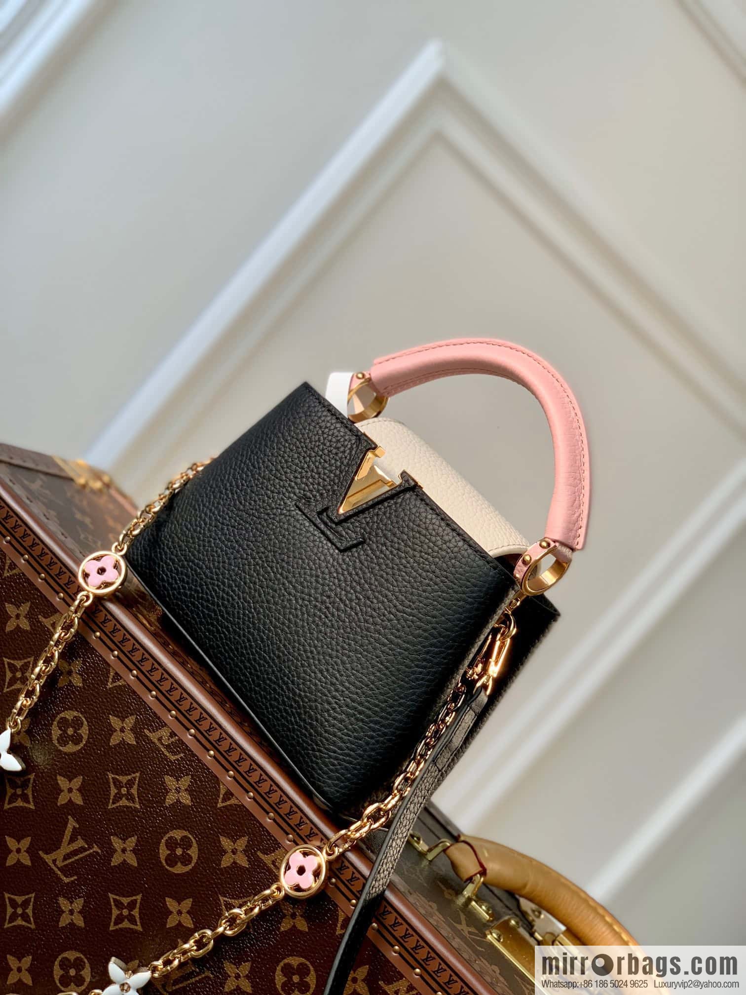 M22375 black mini Capucines mini handbag
