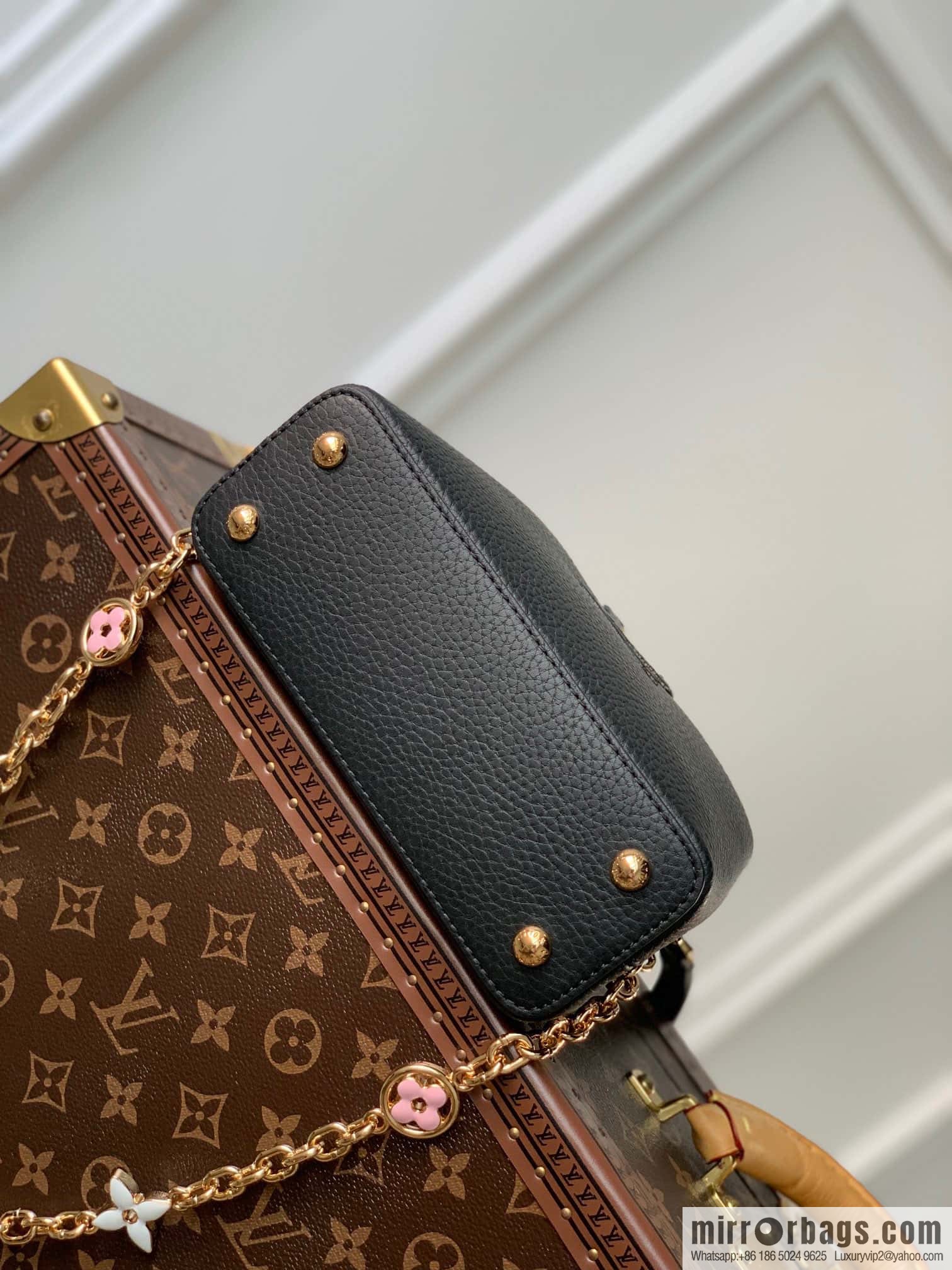 M22375 black mini Capucines mini handbag