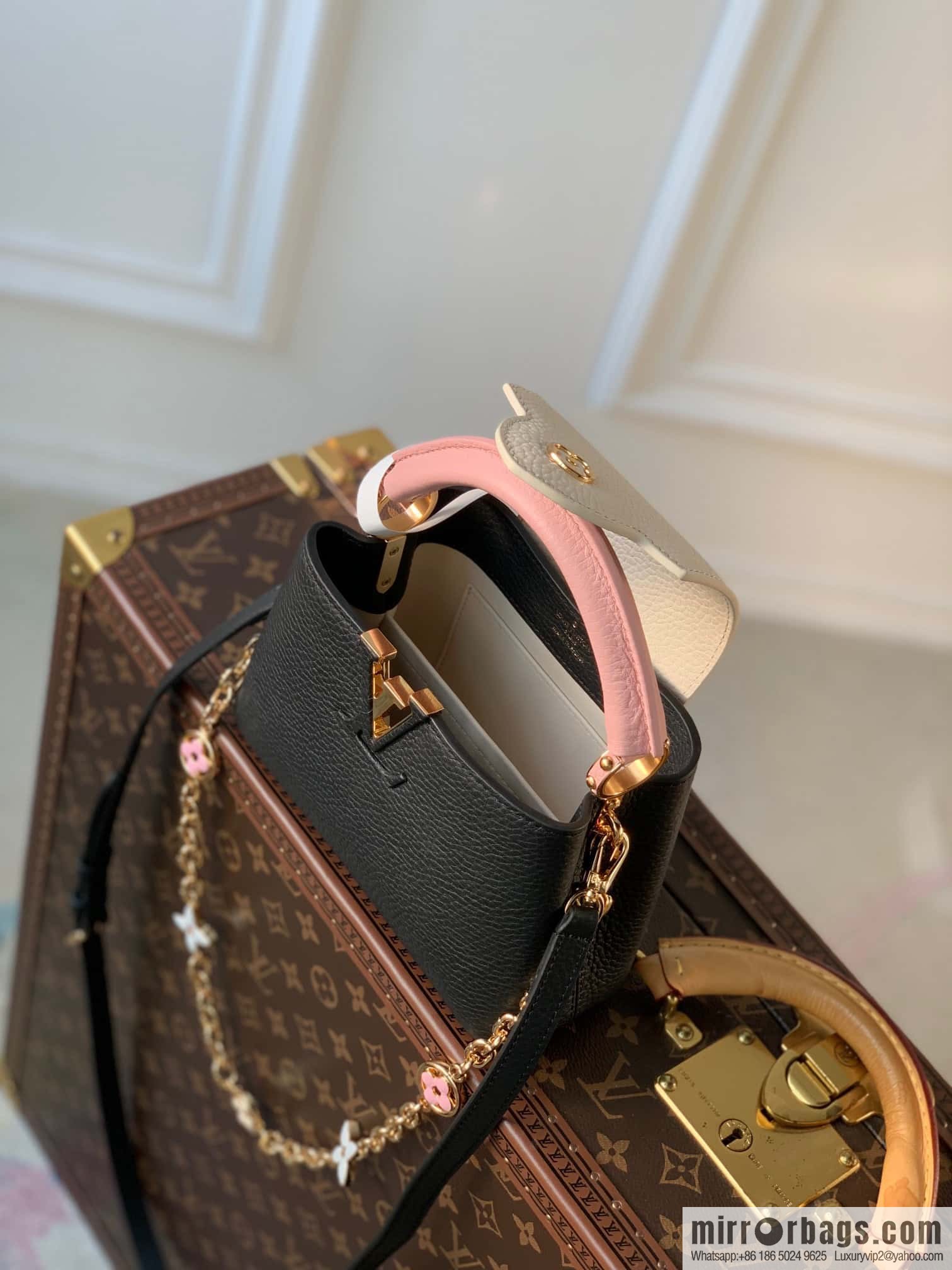 M22375 black mini Capucines mini handbag