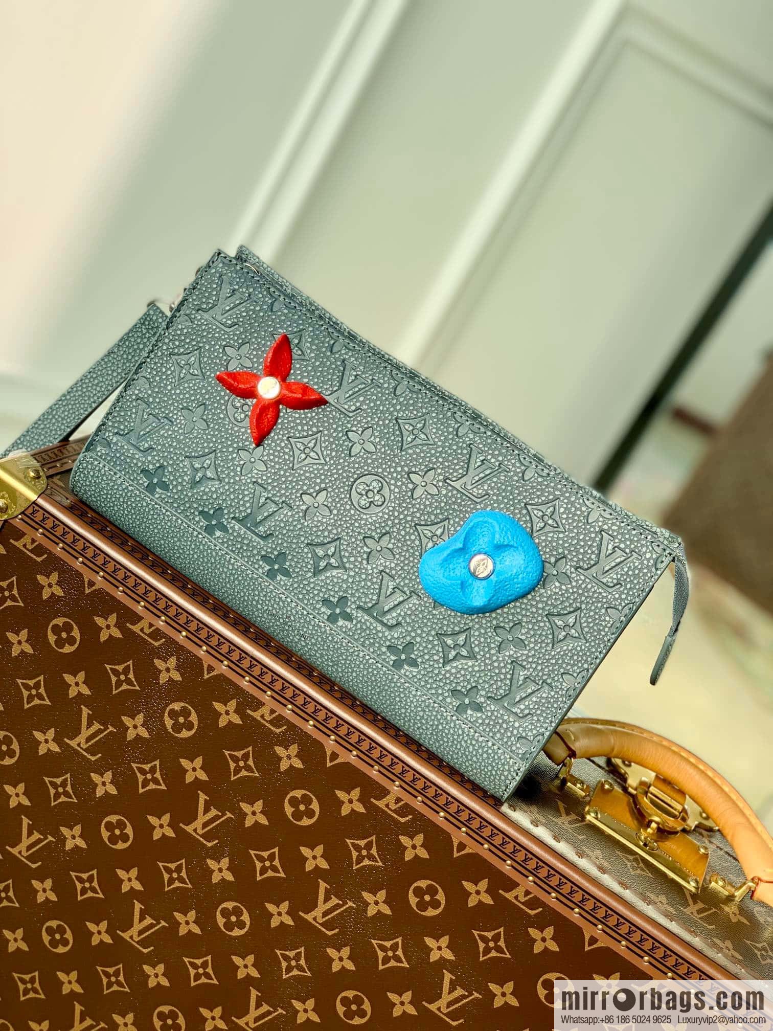 M81556 clutch bag 1934 Louis Vuitton Sac Tricot handbag