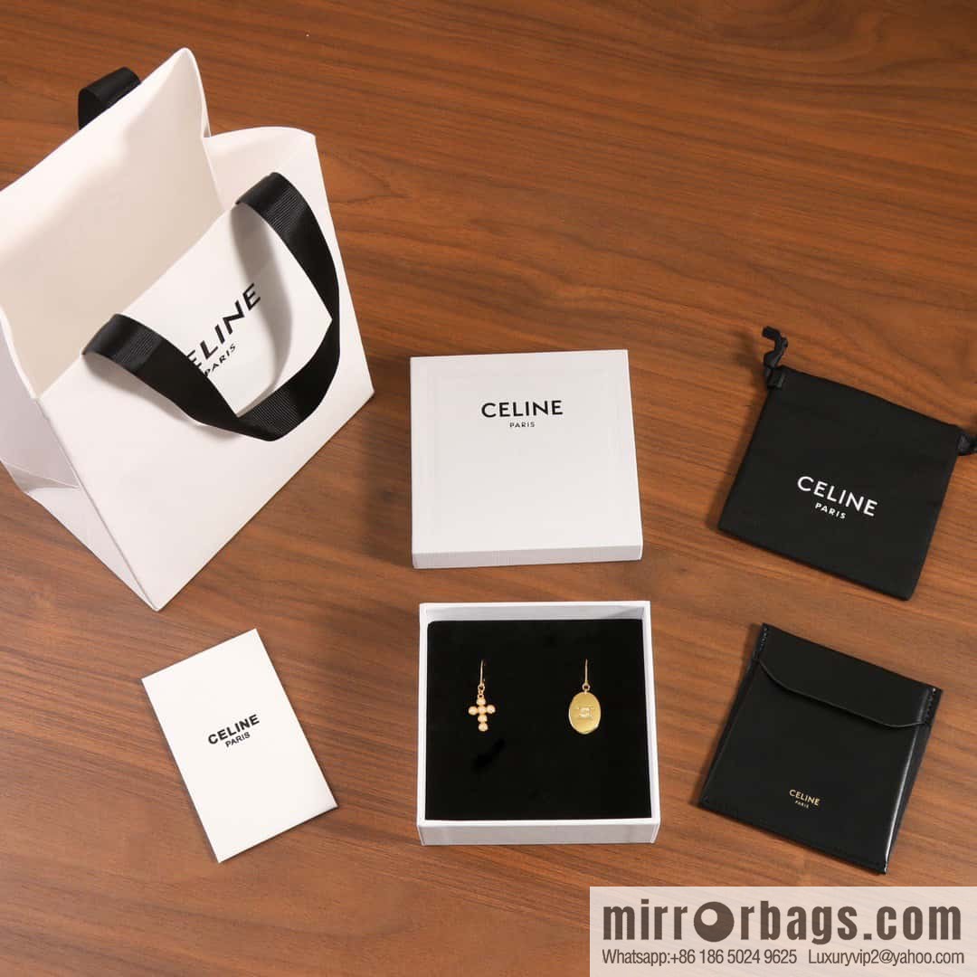 ☀️New ☑️ Celine Asymmetrical Pearl Cross Oval Stud Earrings ☀️