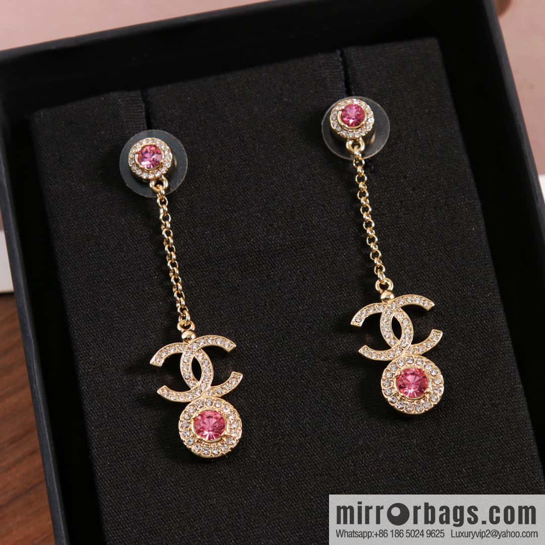 New, Chanel C2 double c round pink diamond stud earrings.