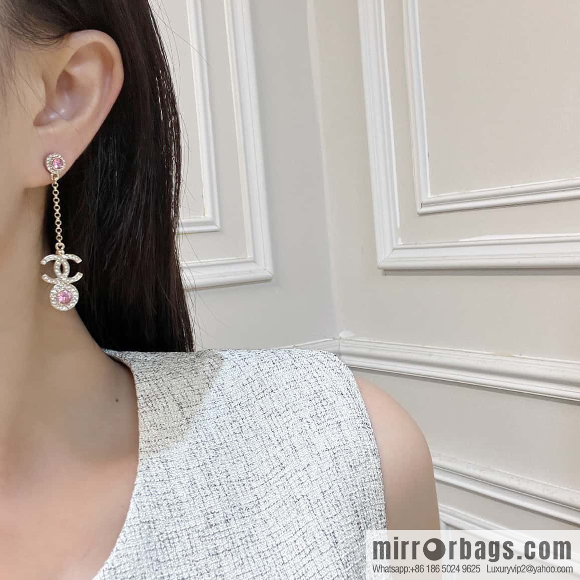 New, Chanel C2 double c round pink diamond stud earrings.