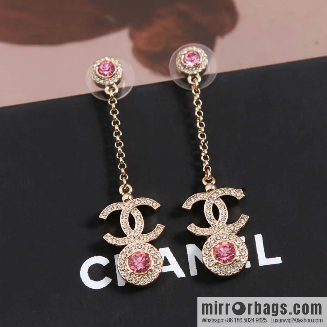 New, Chanel C2 double c round pink diamond stud earrings.