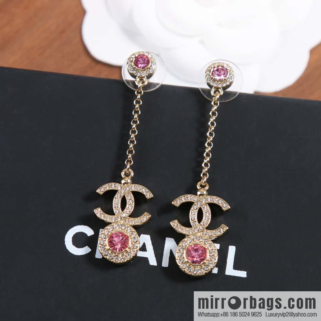 New, Chanel C2 double c round pink diamond stud earrings.