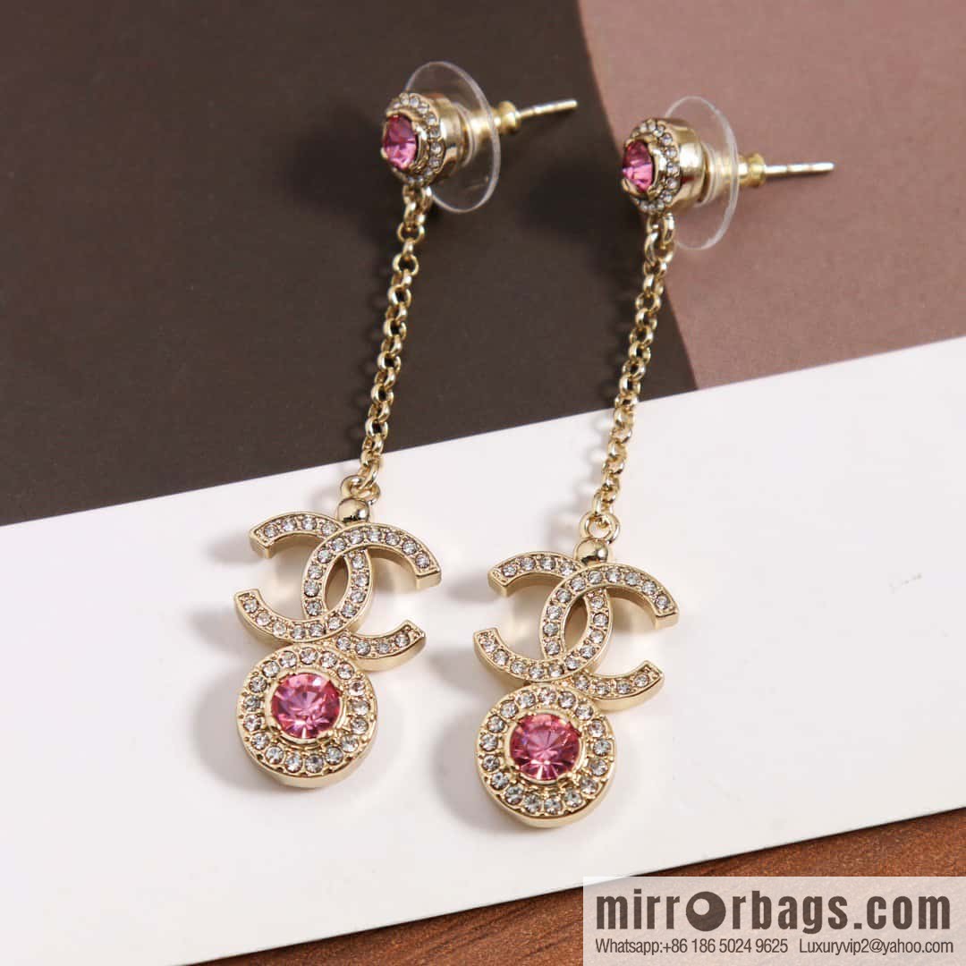New, Chanel C2 double c round pink diamond stud earrings.