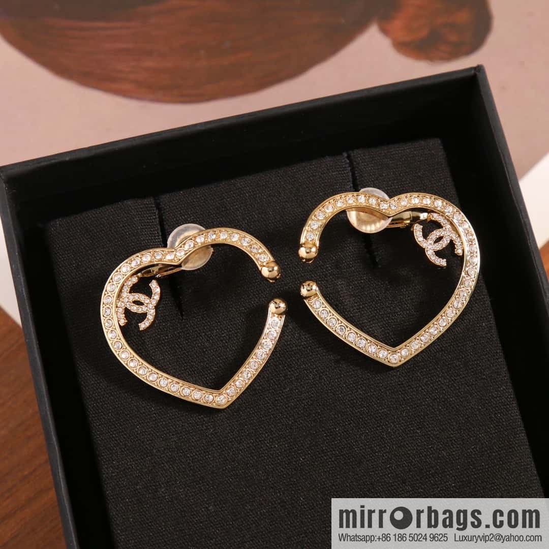 New, Chanel C1 full diamond peach heart love earclip earrings.