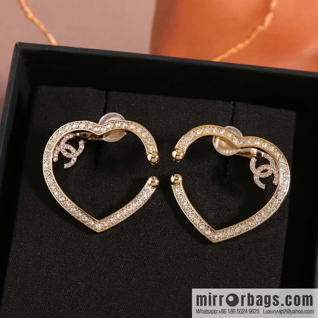 New, Chanel C1 full diamond peach heart love earclip earrings.