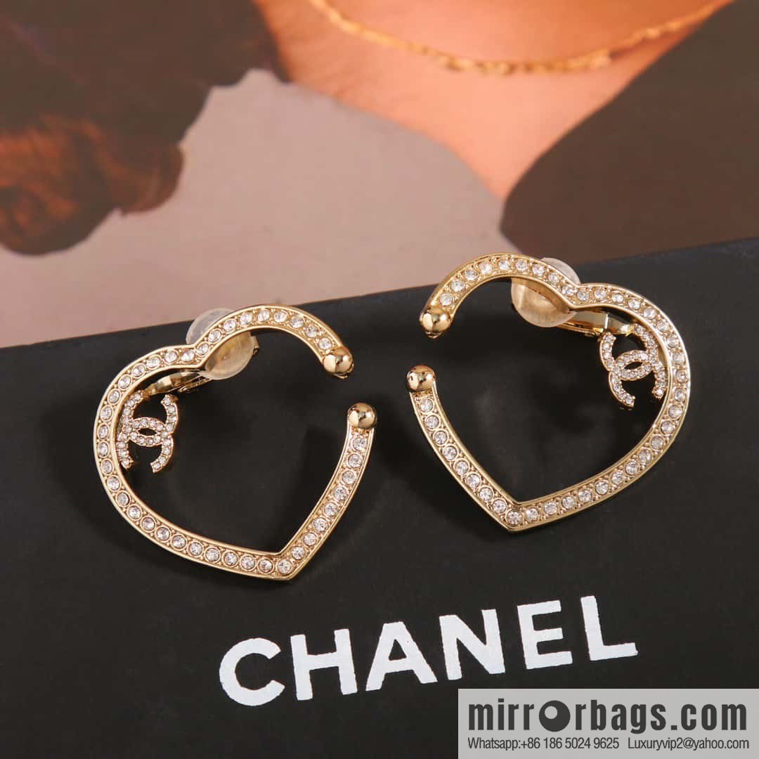 New, Chanel C1 full diamond peach heart love earclip earrings.