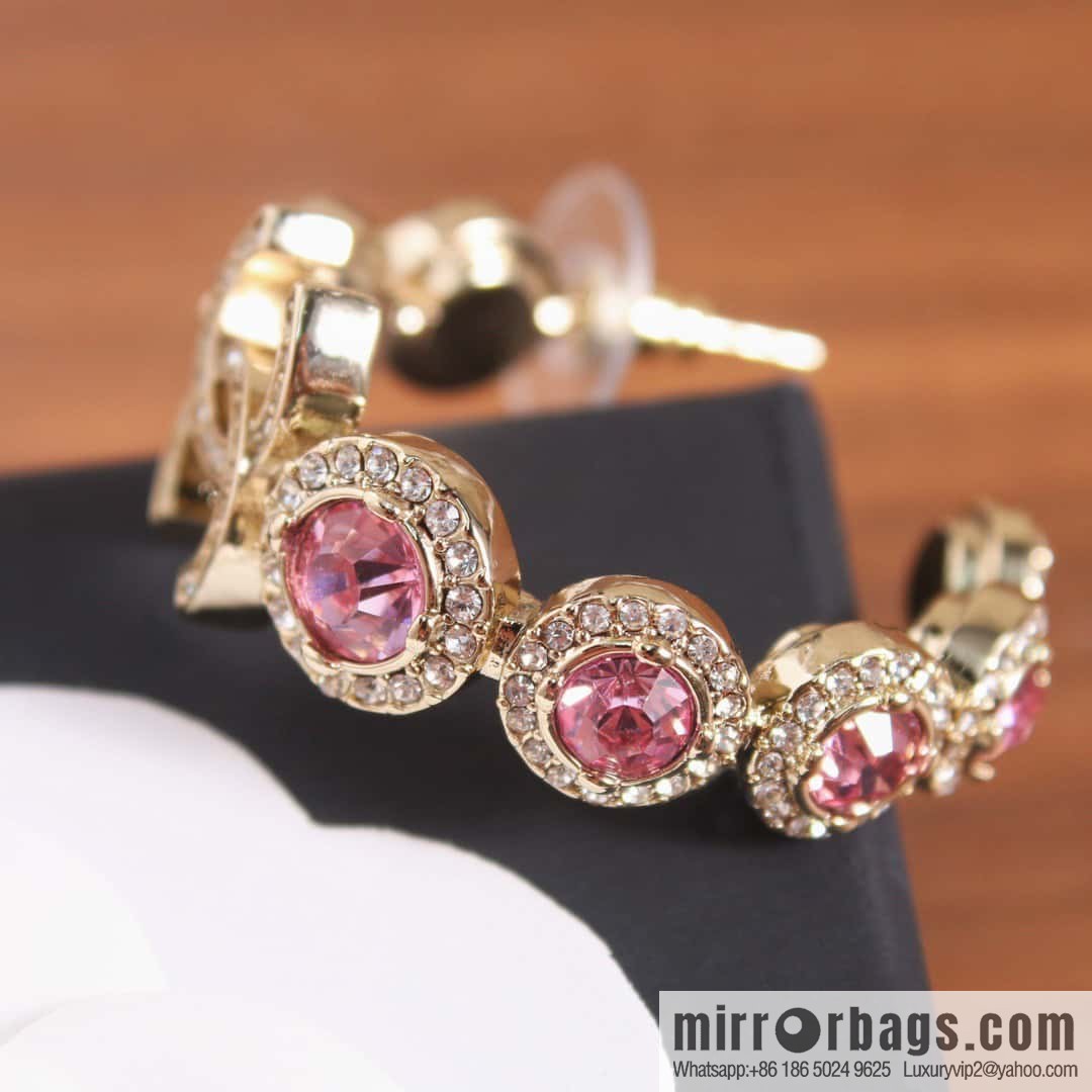 New, Chanel C1 double c semicircular pink diamond stud earrings.